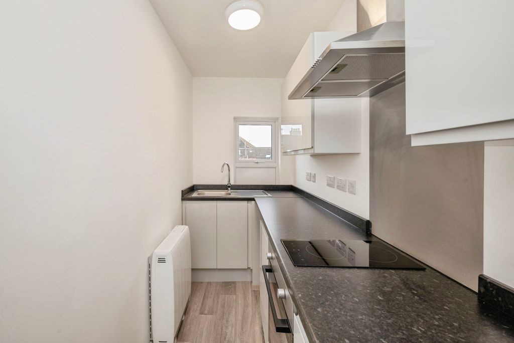 Property photo 3 of 8 Kitchen