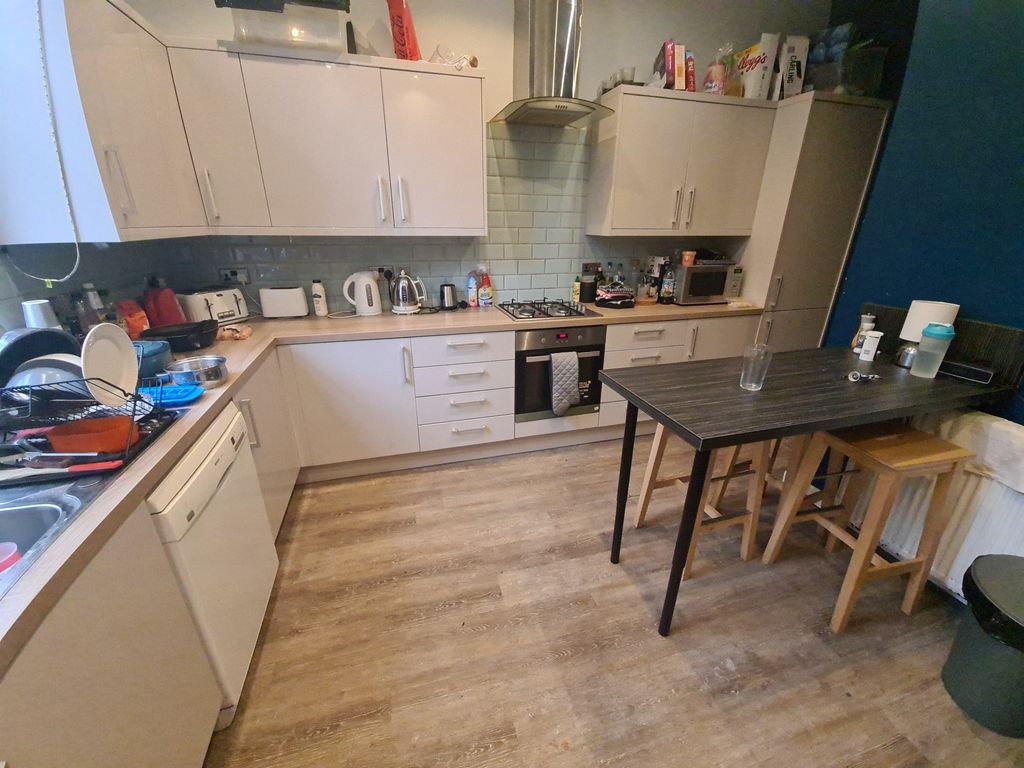 Property photo 1 of 29 A Well-Equipped Kitchen Featuring Modern Appliance...