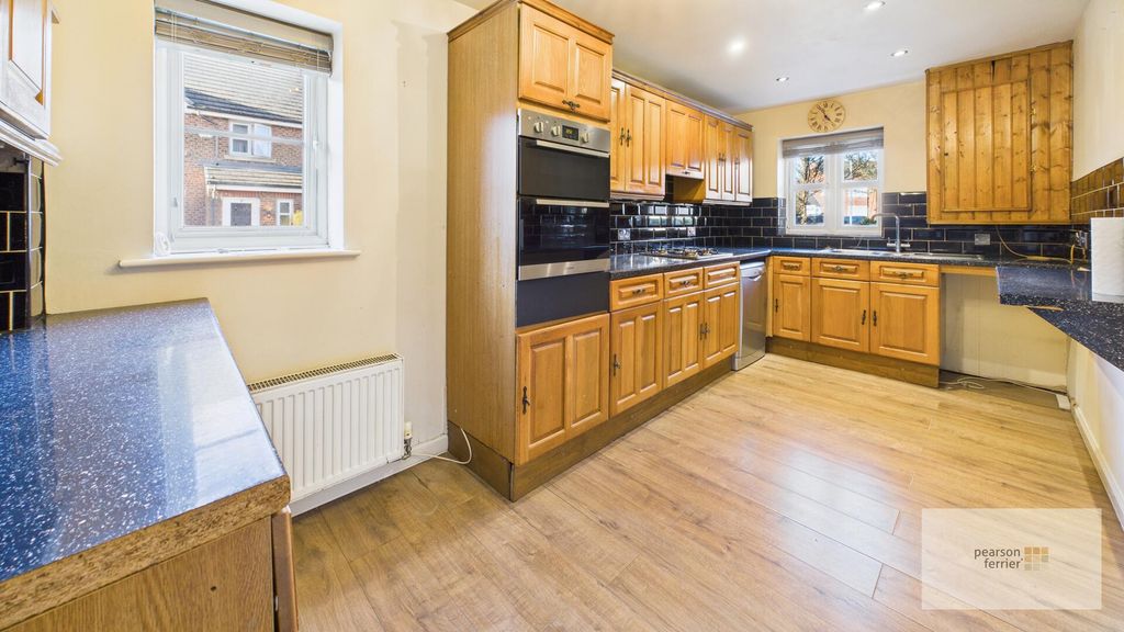 Property photo 3 of 16 Kitchen