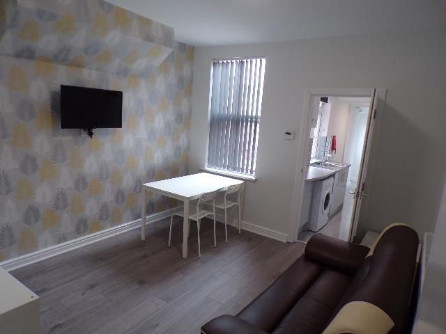 Property photo 3 of 14 Living Area