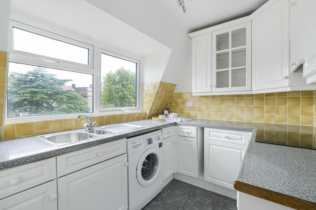 Property photo 3 of 12 Kitchen
