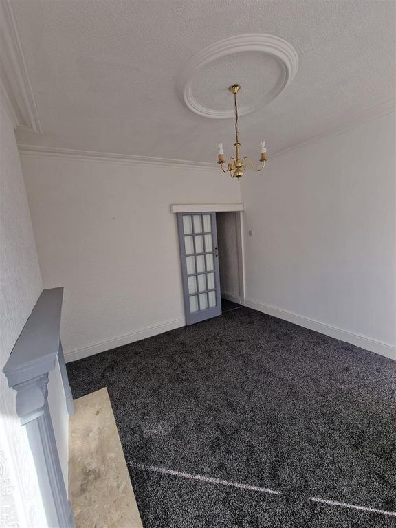 Property photo 3 of 8 Dining Room