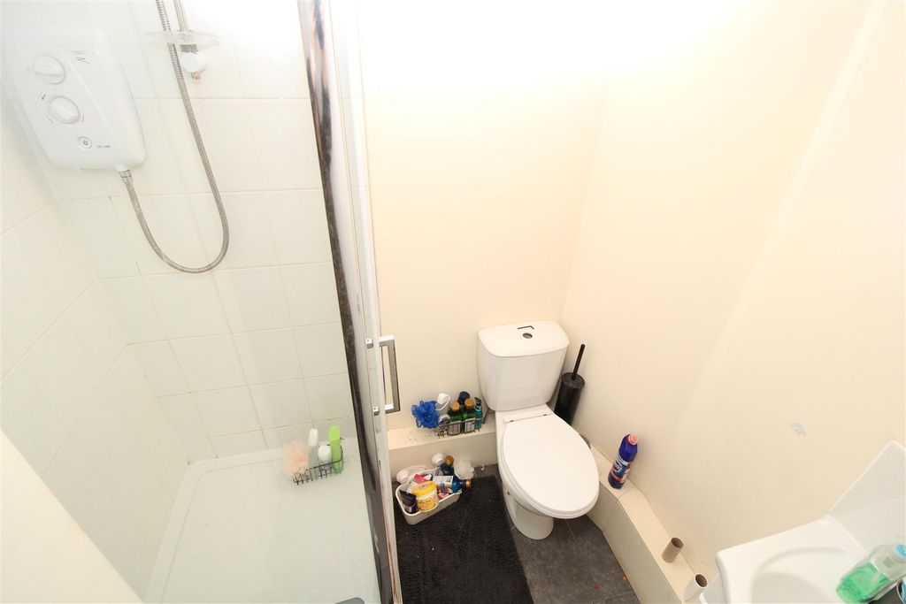 Property photo 2 of 5 Bright Bathroom With Modern Walk-In Shower...