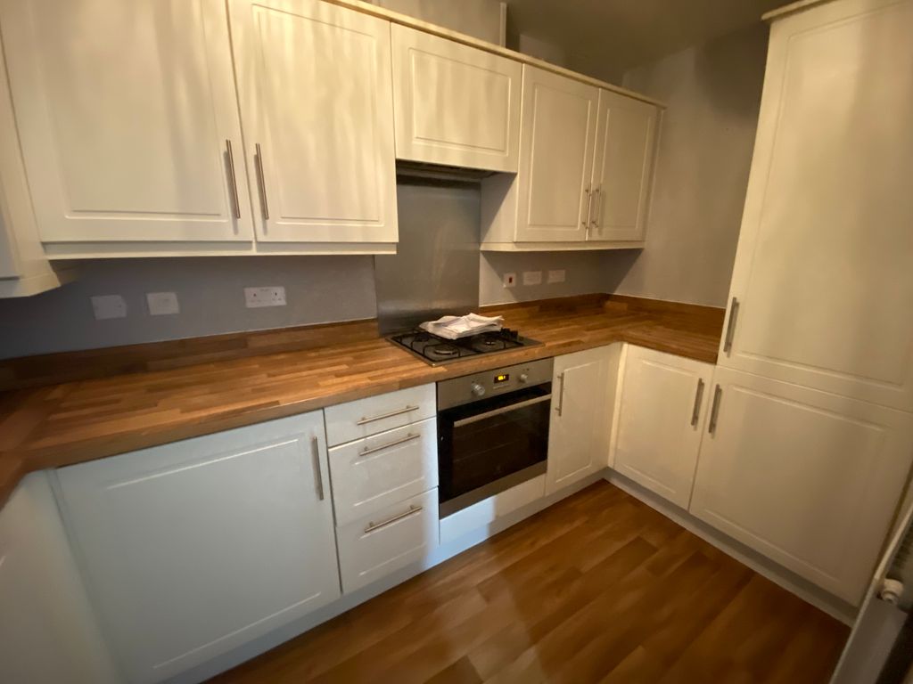 Property photo 3 of 8 Kitchen