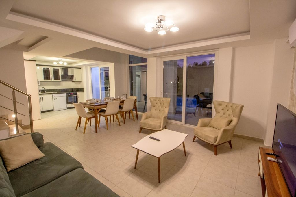 Property photo 3 of 11 An Exquisite Fethiye Property For Sale With Nature Views Â€“ Lounge To The Kitchen