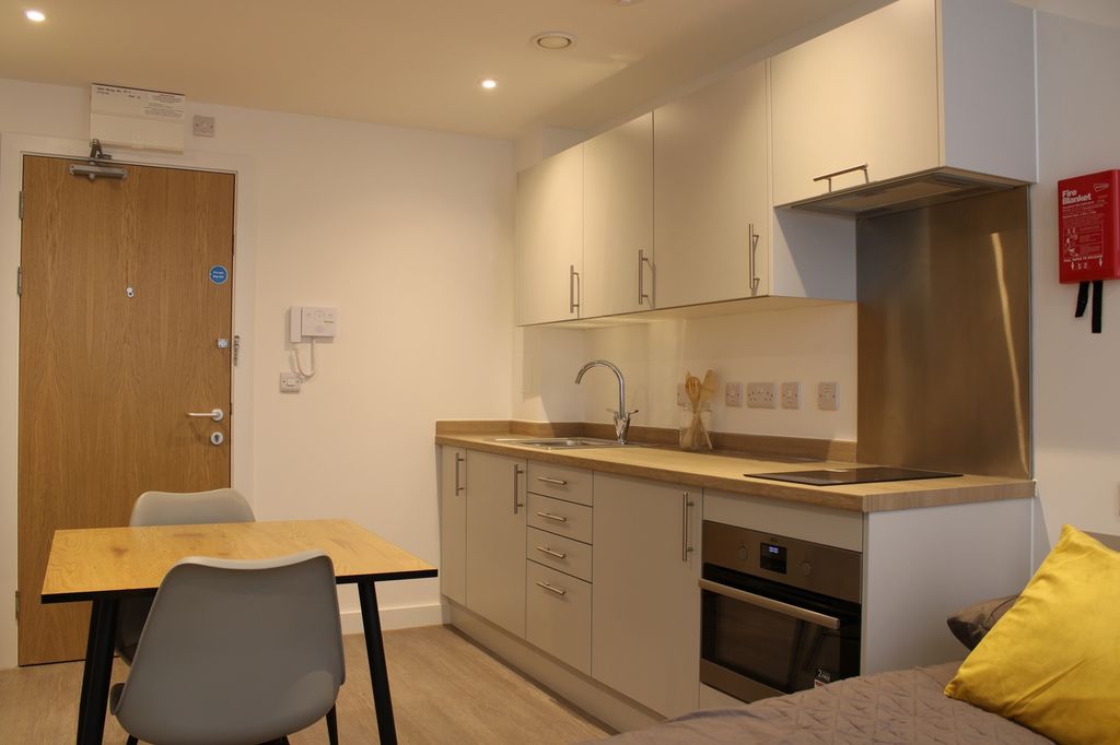 Property photo 1 of 4 A Modern And Clean Kitchenette Featuring Ample Sto...