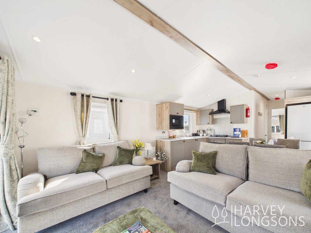 Property photo 2 of 12 Bright Open-Plan Lounge With Freestanding Sofas And Kitchen