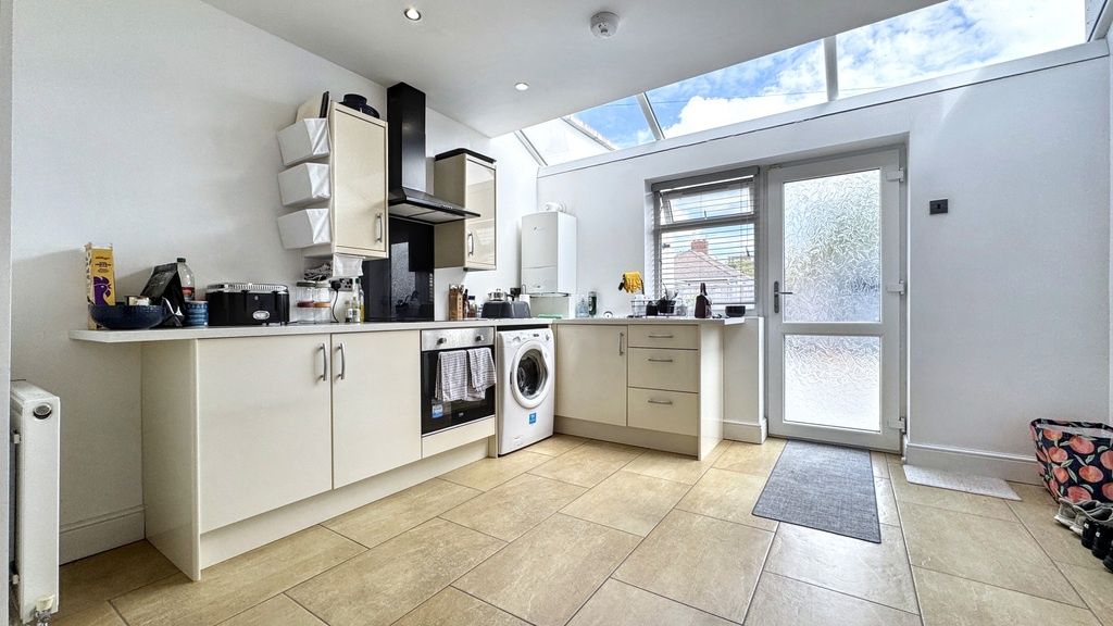 Property photo 2 of 11 Bright Modern Kitchen With White Cabinets, Integra...