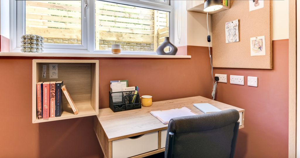 Property photo 1 of 5 A Cozy And Well-Lit Communal Workspace Featuring A...