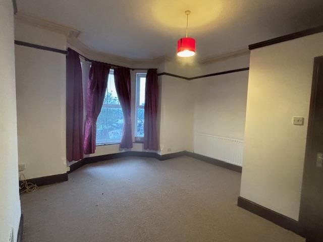 Property photo 2 of 7 Living Area