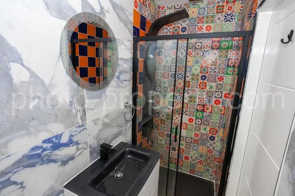 Property photo 3 of 12 A Beautifully Designed Bathroom Featuring Vibrant ...