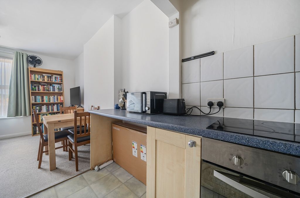 Property photo 2 of 9 Kitchen To Living