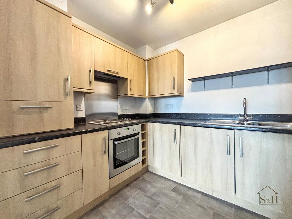 Property photo 3 of 16 Kitchen