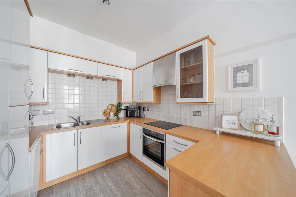 Property photo 3 of 12 Kitchen