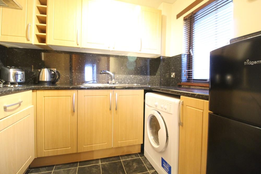 Property photo 3 of 6 Kitchen