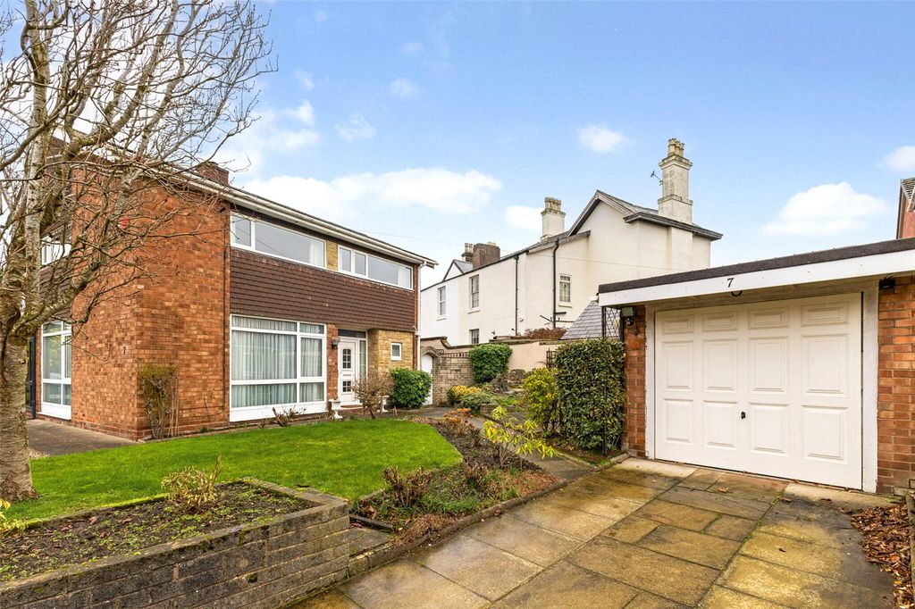 Property photo 1 of 13 Driveway &amp; Garage