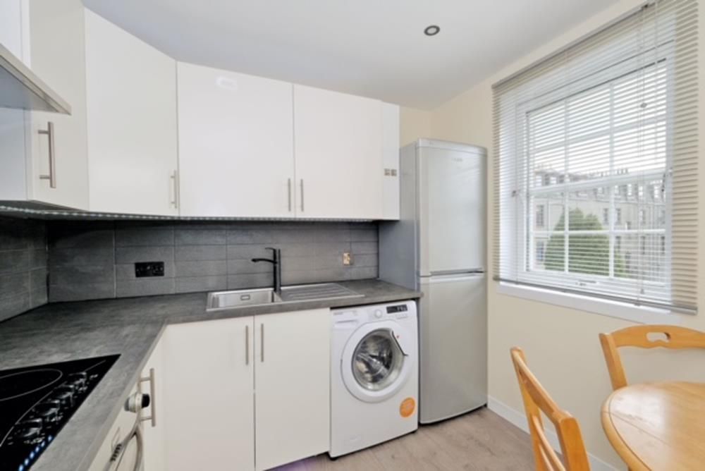 Property photo 3 of 11 Kitchen