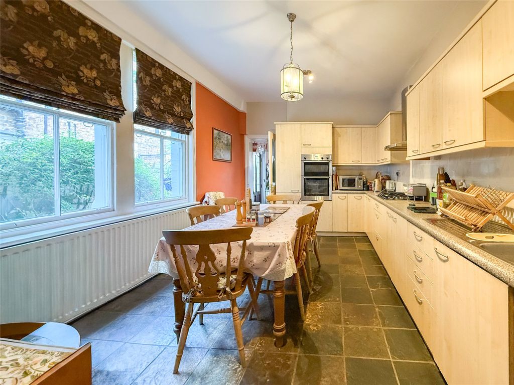 Property photo 3 of 24 Dining Kitchen