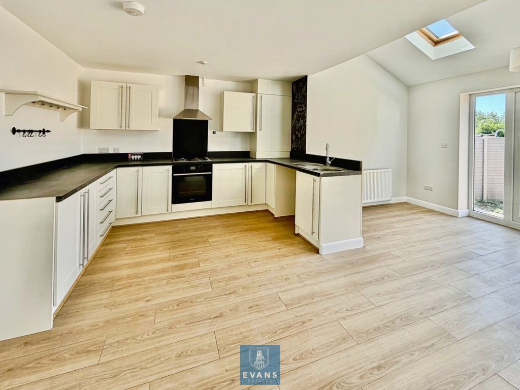 Property photo 2 of 14 Kitchen Area