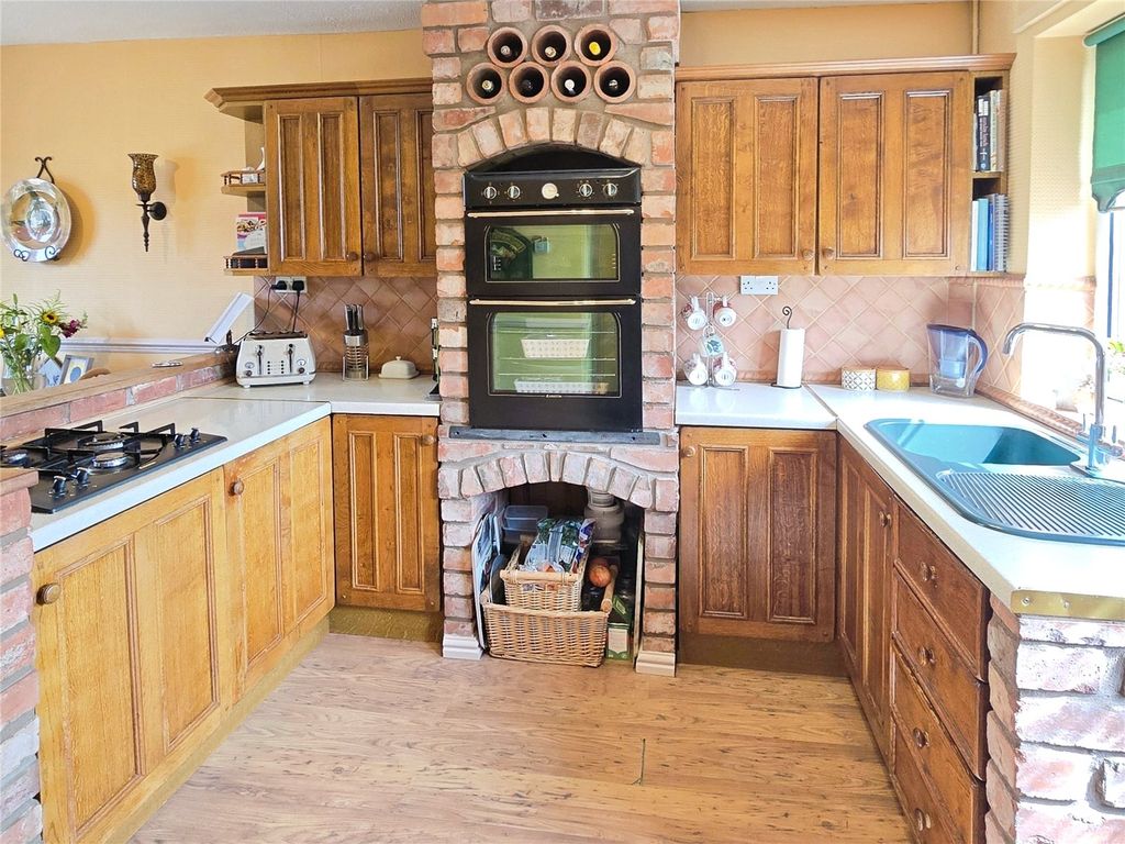 Property photo 3 of 18 Dining Kitchen