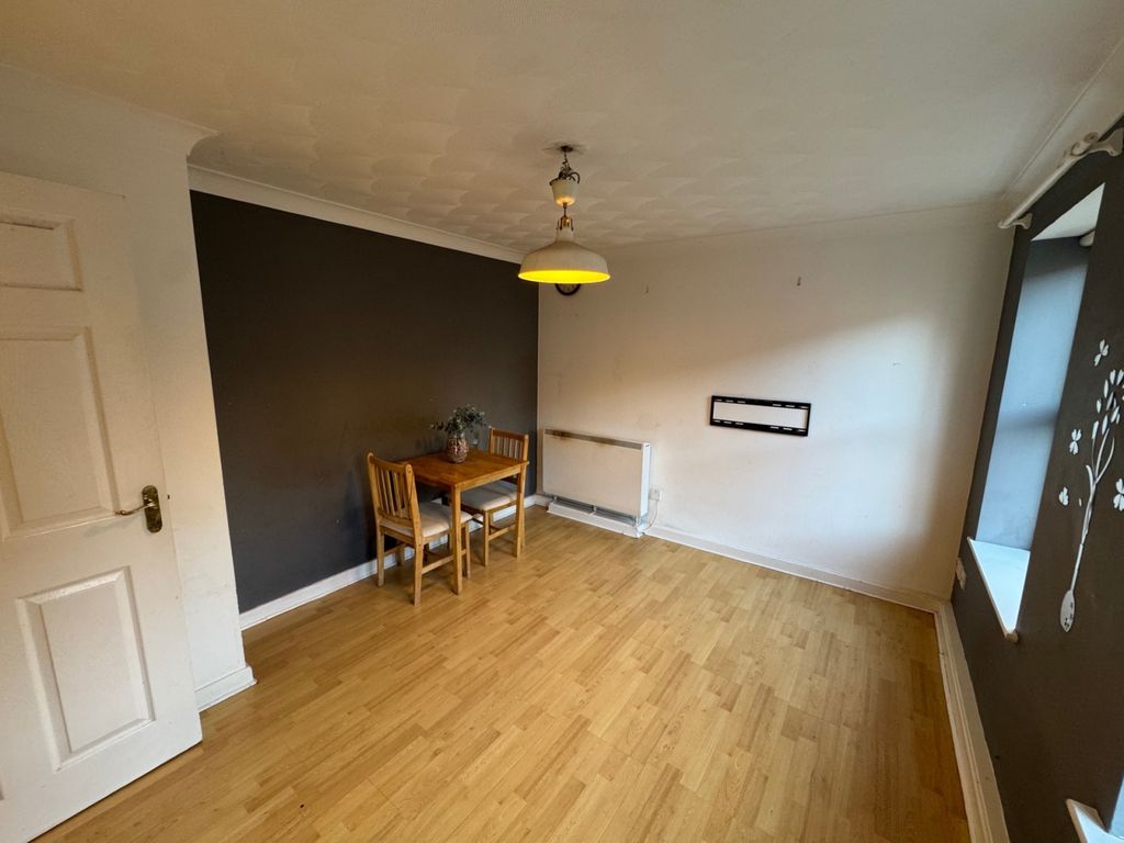 Property photo 2 of 8 Living Area