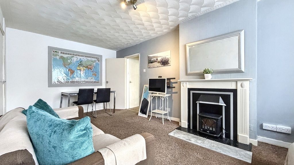 Property photo 3 of 8 Bright, Well-Presented Living Room With A Feature ...