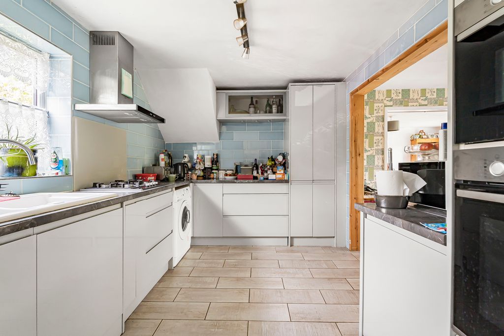 Property photo 3 of 12 Kitchen