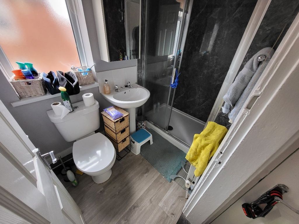 Property photo 2 of 6 Modern And Well-Maintained Bathroom With A White T...