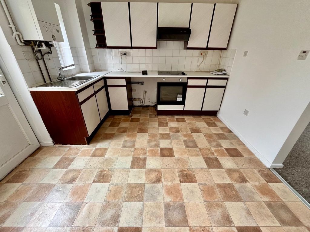 Property photo 3 of 10 Kitchen Area