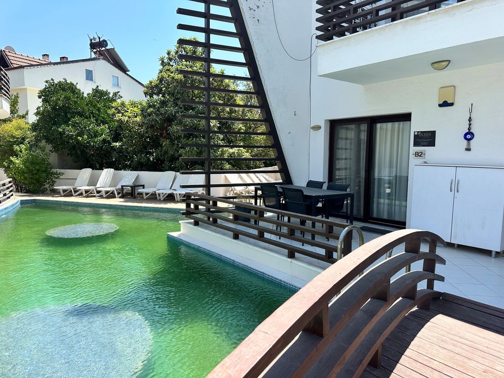 Property photo 1 of 17 Delightful Riverside Apartment For Sale In Dalyan - Gorgeous Apartment With A Swim-Up Pool