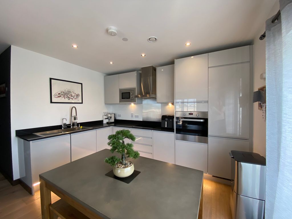 Property photo 1 of 15 Kitchen Area