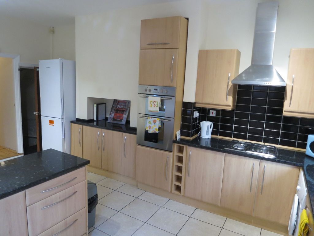 Property photo 2 of 22 Modern Kitchen With Wooden Cabinets, Black Counter...