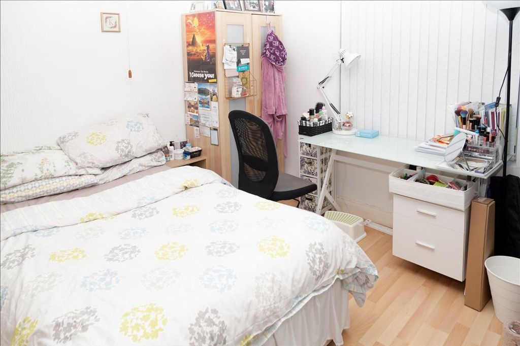 Property photo 3 of 19 A Cozy Double Bedroom Featuring A Comfortable Bed,...