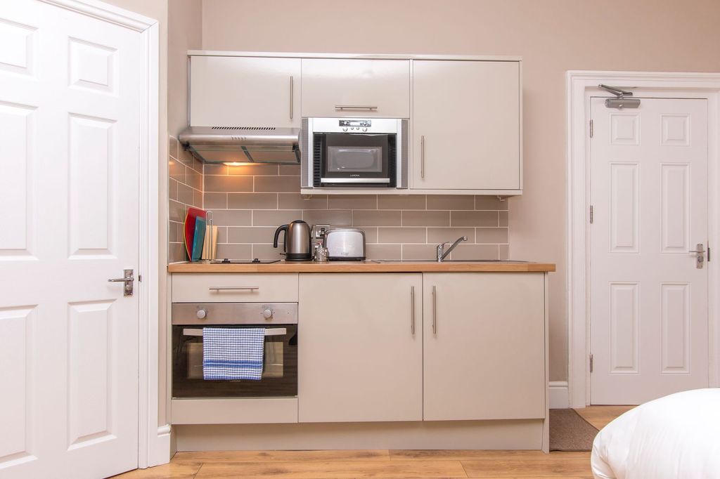 Property photo 1 of 5 Well-Appointed Compact Kitchen With Neutral Cabine...