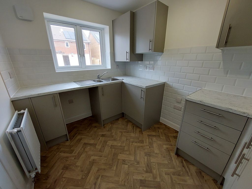 Property photo 2 of 15 Typical Kitchen