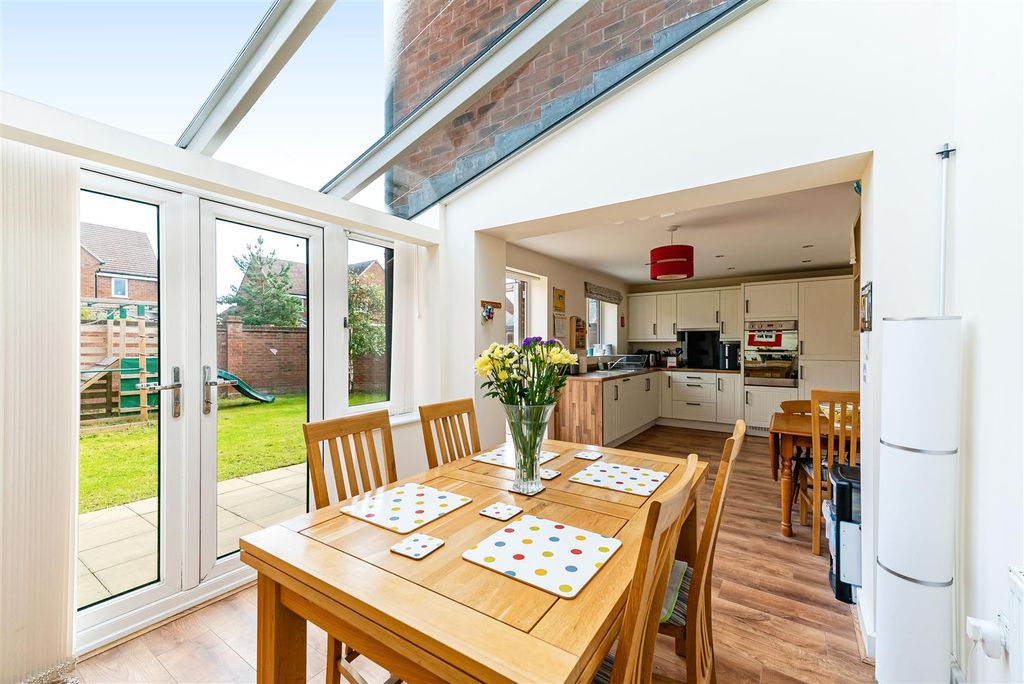 Property photo 3 of 28 Kitchen/Dining/Family Room