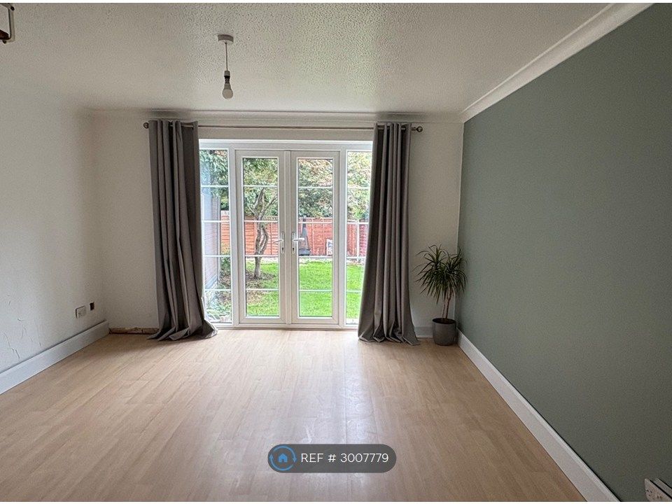 Property photo 2 of 4 Living Room With French Doors On To A Patio