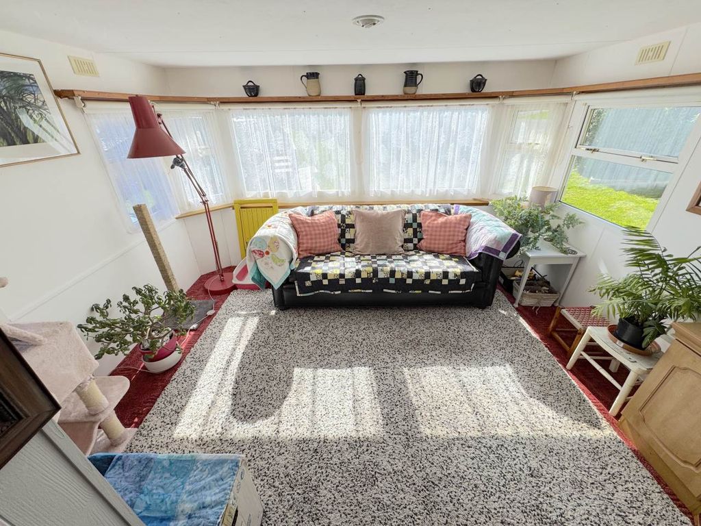 Property photo 2 of 12 Living Room