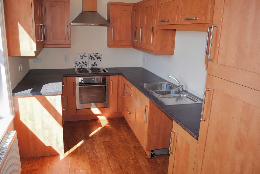 Property photo 3 of 9 Kitchen Area