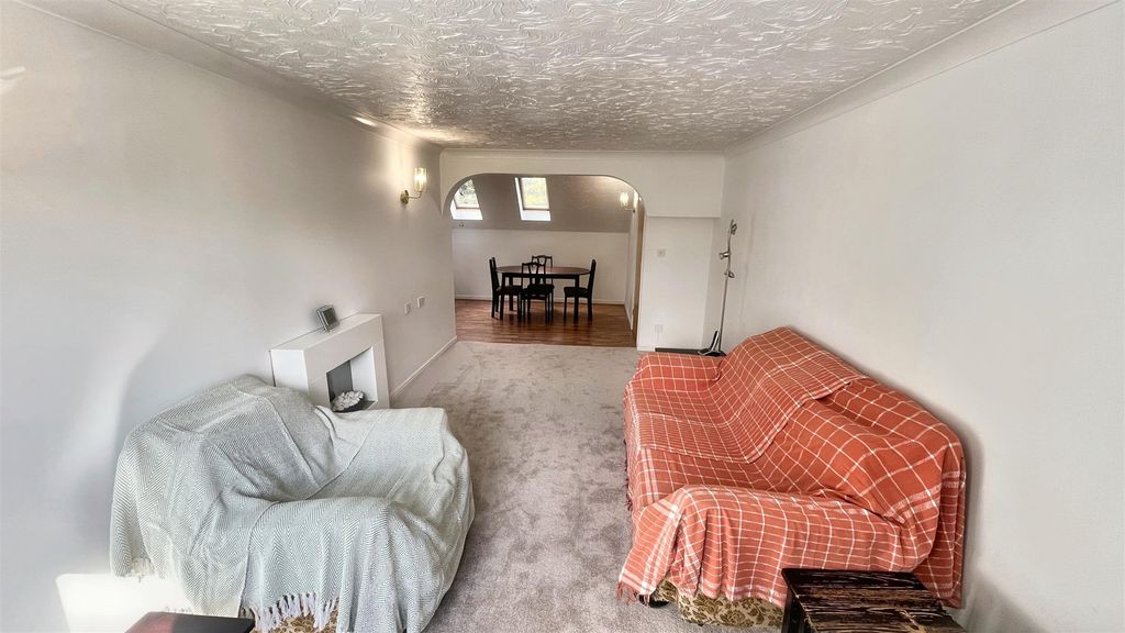 Property photo 3 of 12 Living/Dining Area