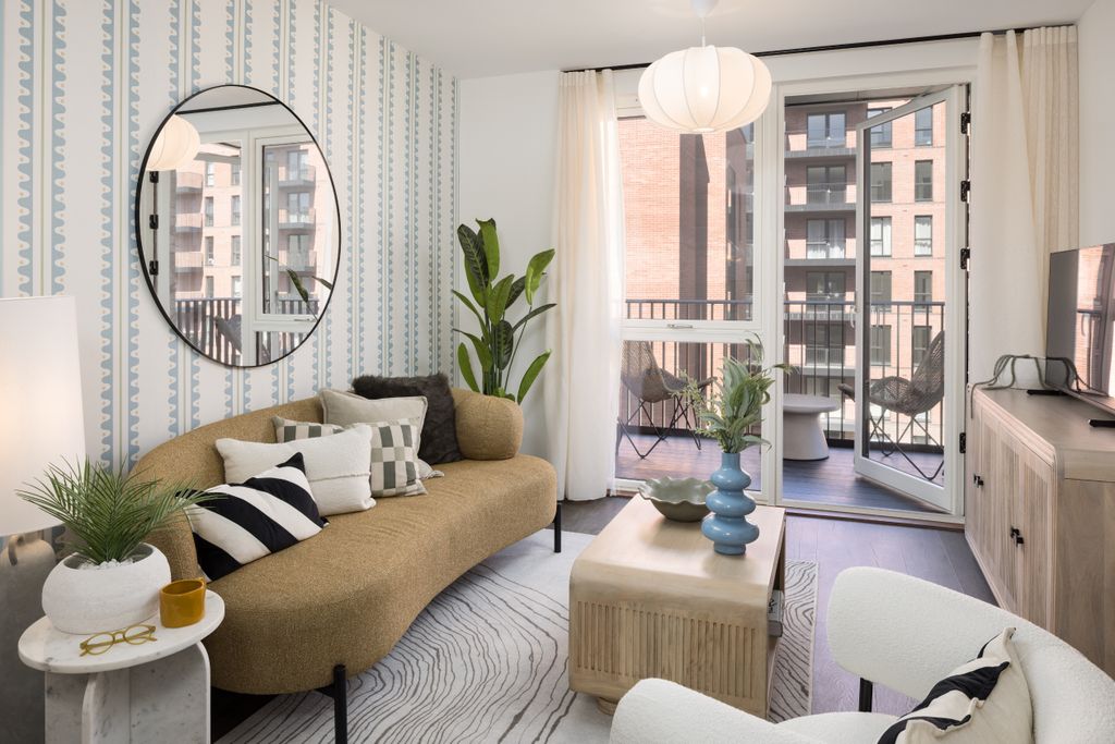 Property photo 1 of 7 Menier Apartments - 2-Bedroom Lounge