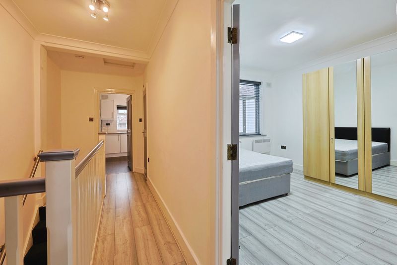 Property photo 1 of 7 Hallway + Bedroom