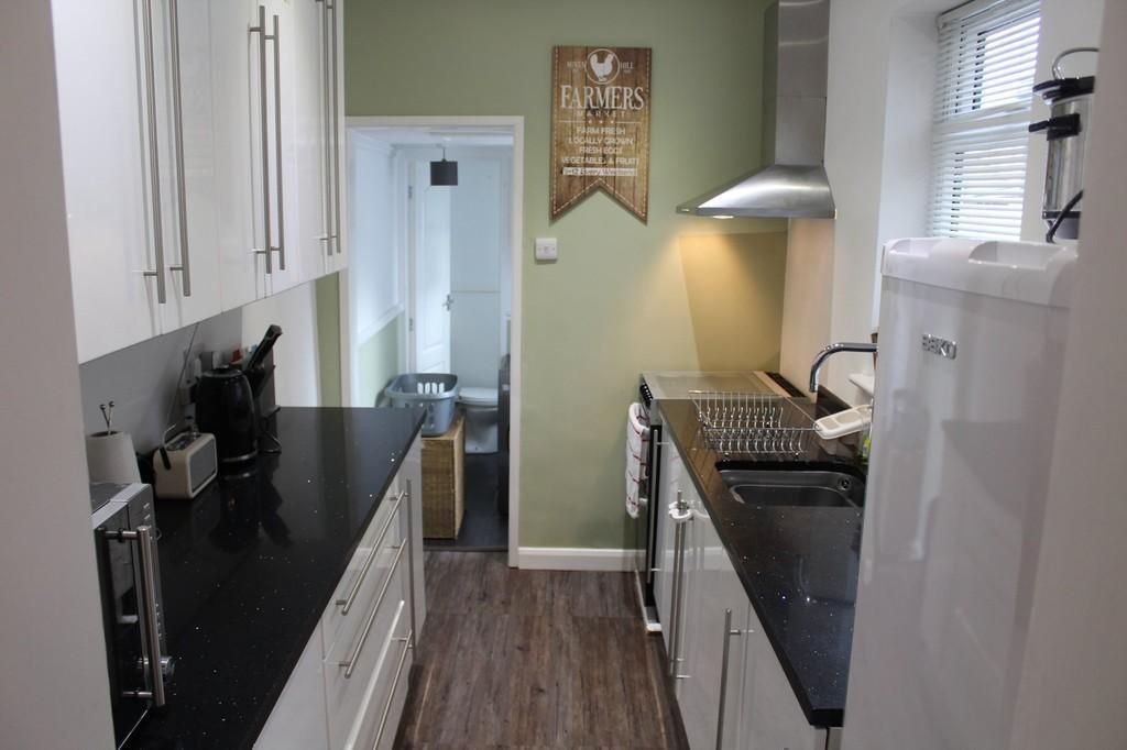 Property photo 3 of 12 Kitchen