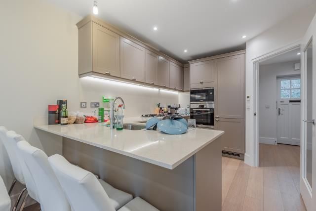 Property photo 3 of 8 Kitchen