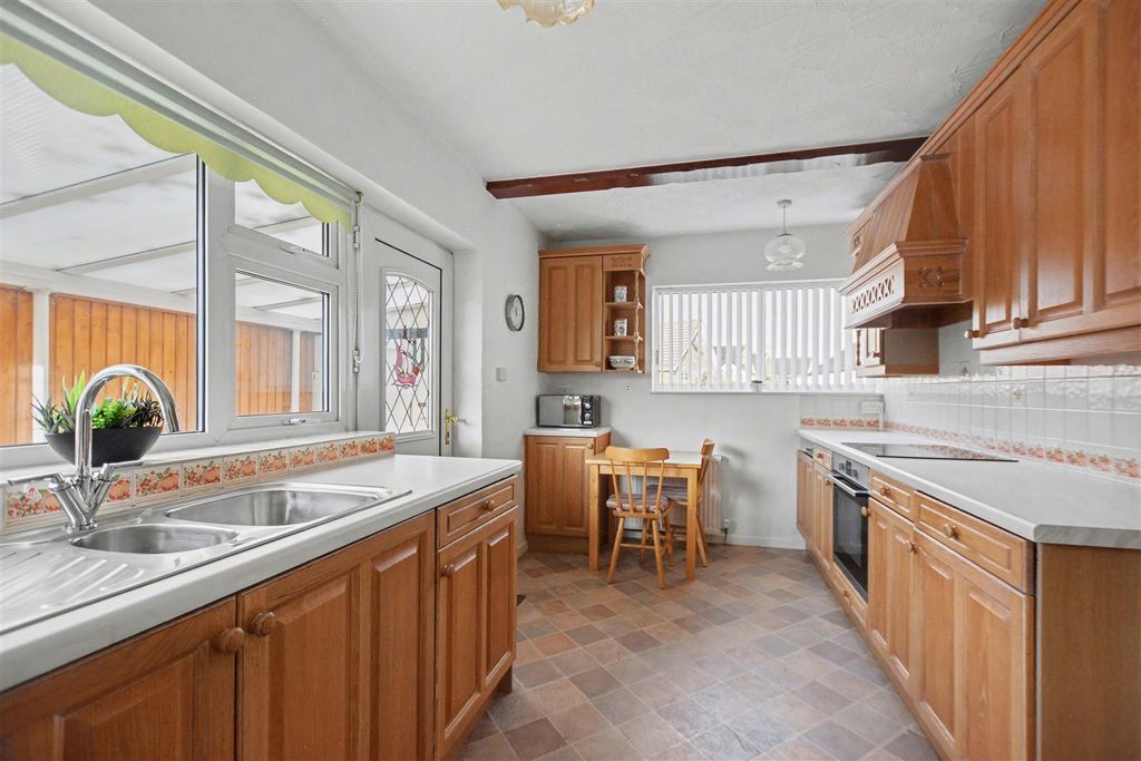 Property photo 3 of 16 Dining Kitchen