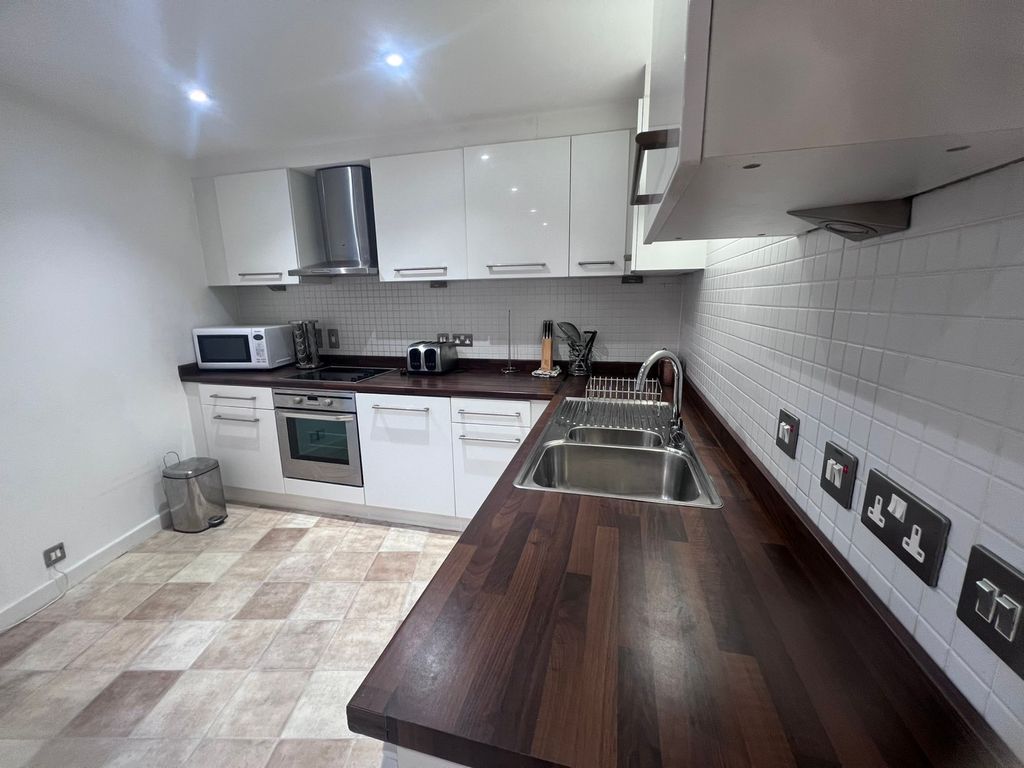 Property photo 2 of 8 Kitchen