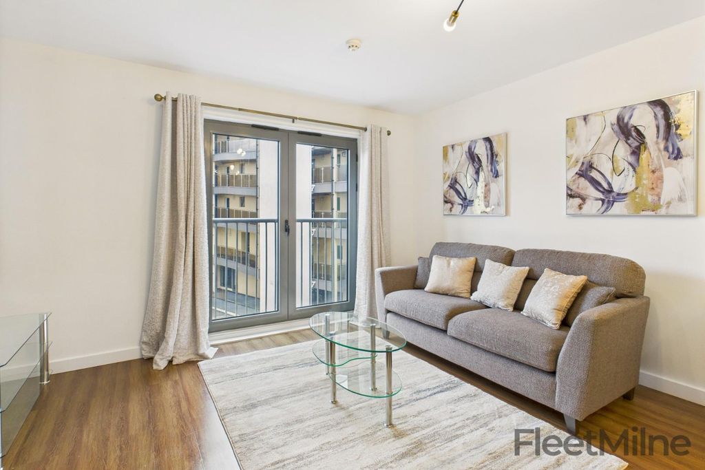 Property photo 1 of 12 Living Area