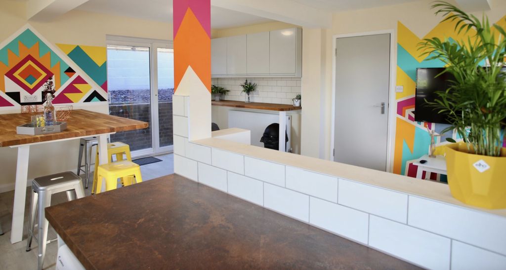 Property photo 3 of 7 Bright And Vibrant Kitchen Space Featuring Modern ...