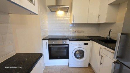 Property photo 2 of 12 Kitchen