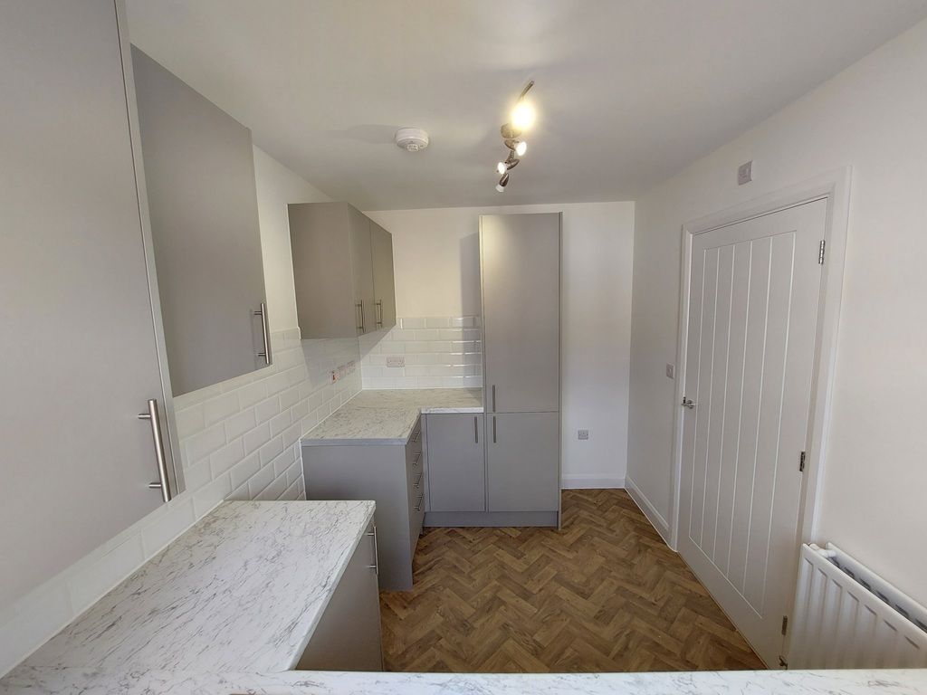 Property photo 3 of 15 Typical Kitchen